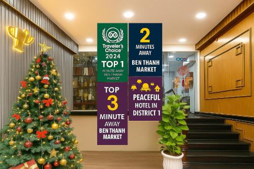 a christmas tree in the hallway of a store at Diamond Luxury Ben Thanh in Ho Chi Minh City