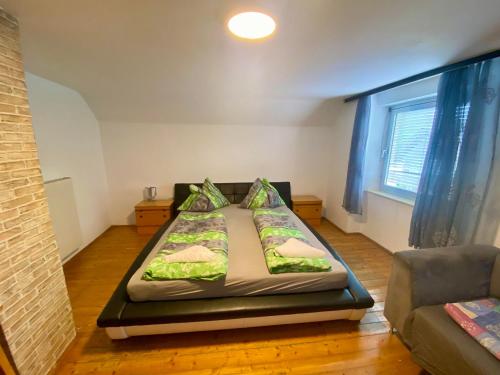 Postel nebo postele na pokoji v ubytování Land-Wohnung Behr