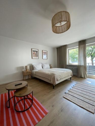 Ένα ή περισσότερα κρεβάτια σε δωμάτιο στο NEU - Apartment Lago am Chiemsee