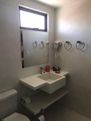 Un baño de Girassóis Suítes