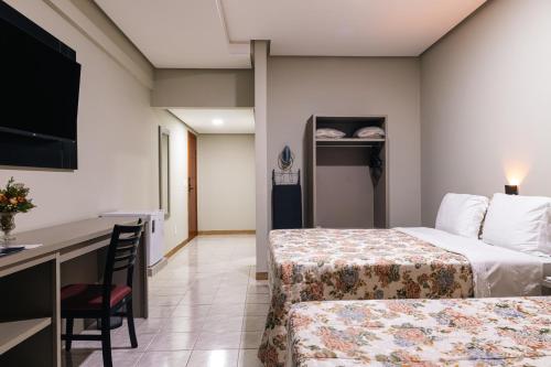 Voodi või voodid majutusasutuse Hotel Dan Inn Uberlandia By Nacional Inn toas