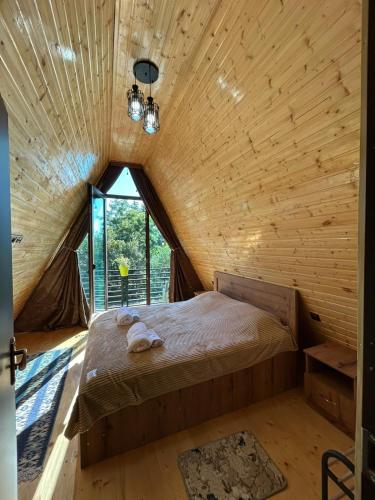 Postel nebo postele na pokoji v ubytování Hunter's Cabin