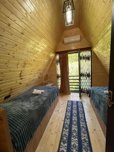 Postel nebo postele na pokoji v ubytování Hunter's Cabin