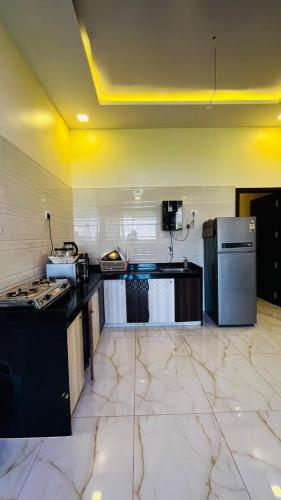 Kuchyň nebo kuchyňský kout v ubytování Swastik villa B7