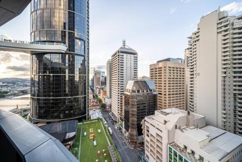 an aerial view of a city with tall buildings at Skyscraper Cinema - Dream a thousand city lights in Brisbane