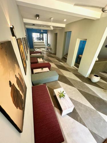 a living room with a checkered floor at 234 Weligama in Pareiduwa