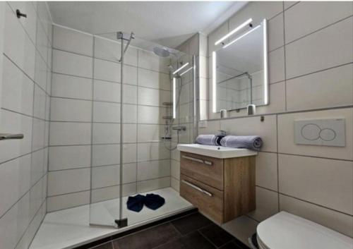 Koupelna v ubytování Ferienpark Oberallgäu - FeWo "Klatschmohn" Hallenbad & Sauna & WLAN