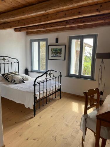 Postel nebo postele na pokoji v ubytování Casale nel mezzo dei vigneti