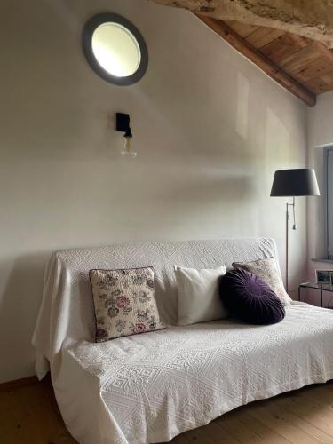 Postel nebo postele na pokoji v ubytování Casale nel mezzo dei vigneti