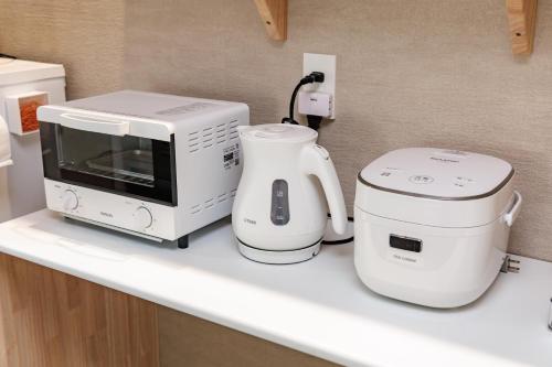 Una cocina o cocineta en 陶霞の宿 Toka no Yado