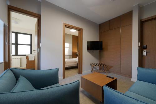Hotel Orasac Garni tesisinde lounge veya bar alanı