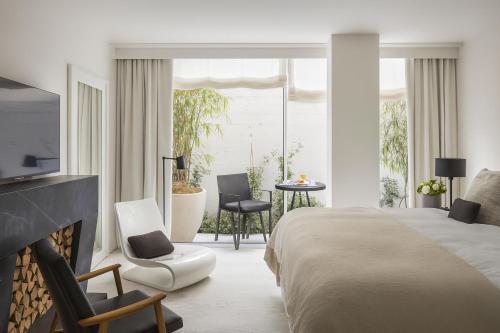Postel nebo postele na pokoji v ubytování Urban Hotel Tel Aviv