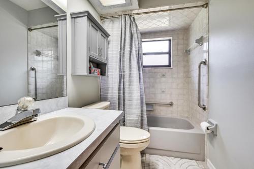 a bathroom with a sink and a toilet and a tub at Golf Course Views! Home 10 Mi to Crystal River in Citrus Springs