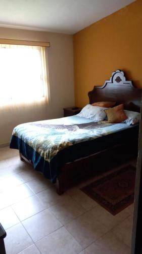 Postel nebo postele na pokoji v ubytování Casa de campo