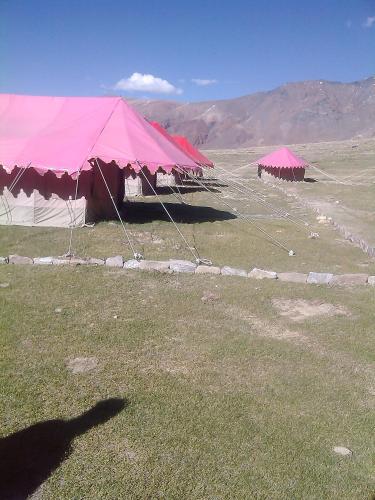 a group of tents in the middle of a field at Himalayan Routes Camp Sarchu in Sir Bhum Chun