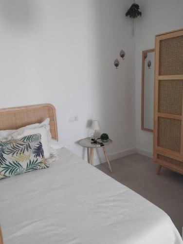 Ένα ή περισσότερα κρεβάτια σε δωμάτιο στο Casa Eva - Adults Only
