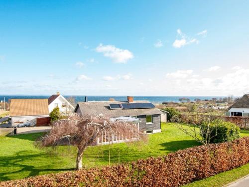 a house with a view of the ocean at 6 person holiday home in Augustenborg in Augustenborg