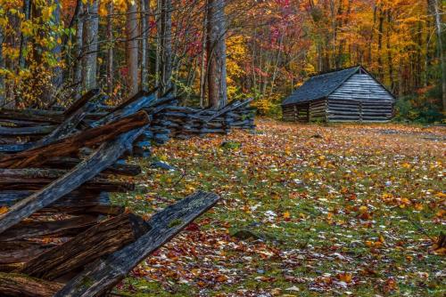 a painting of a fence and a barn at Comfortable Stay Private Hot tub W Arcade in Sevierville