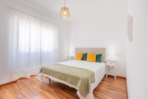 Postel nebo postele na pokoji v ubytování FLH Carvoeira House with Terrace