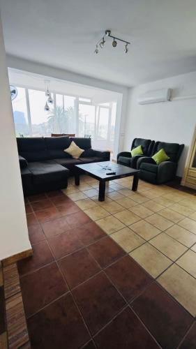 Zona de estar de Calpe chalet privado 7 min de la playa piscina wifi parking aire barbacoa grupos