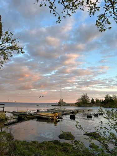 a group of boats in the water on a lake at Archipelago House With Sea View Near Ronneby in Bräkne-Hoby