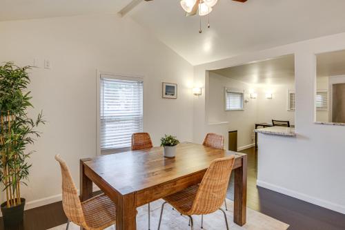 a dining room with a wooden table and chairs at 2 Mi to Ocean Pet-Friendly Imperial Beach Retreat in Imperial Beach