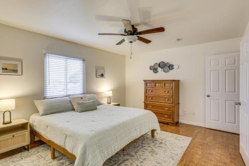 a bedroom with a bed and a ceiling fan at 2 Mi to Ocean Pet-Friendly Imperial Beach Retreat in Imperial Beach
