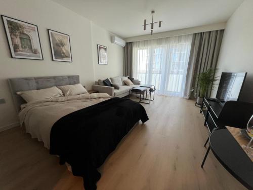 TV/trung tâm giải trí tại Panorama Level 12 z balkonem