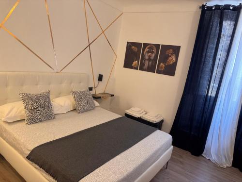 Postel nebo postele na pokoji v ubytování Palazzo Sant'Elia