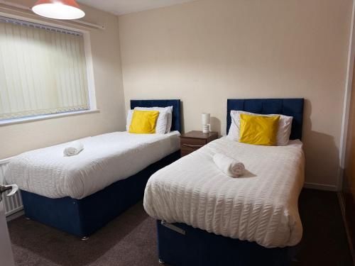 Katil atau katil-katil dalam bilik di Lovely 3 Bed House in Oadby-Leicester
