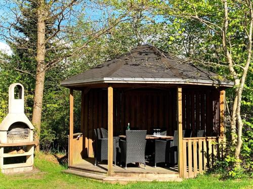 Κήπος έξω από το 7 person holiday home in Gilleleje