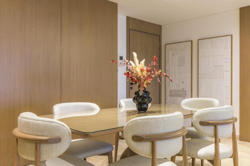 a dining room with a table and chairs at Aluma 2-BR Apt & Balcony at Waterfront Dbayeh in Dbayeh