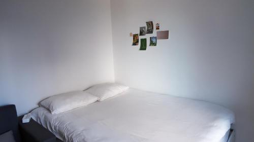 CatNap Guesthouseにあるベッド