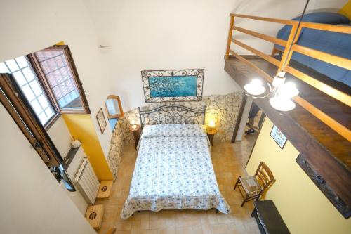 an overhead view of a bedroom with a bed at Tramonti Divini - Amalfi Coast Country House in Tramonti