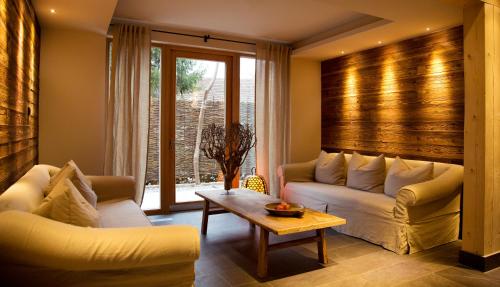 Posezení v ubytování Wellness & Thermal Retreat Das Mühlbach