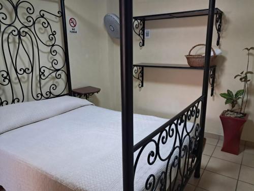 Postel nebo postele na pokoji v ubytování Hotel Antigua Encomienda