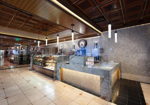 a donut shop with a counter in the middle of a restaurant at Peppermill Hotel Casino in W Wendover, Nevada in West Wendover