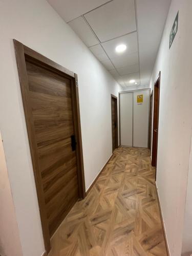 an empty hallway with a door and a hallway at HAD Valencia in Valencia
