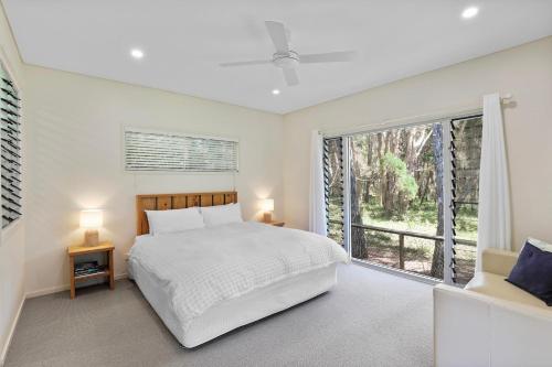 Una cama o camas en una habitación de Amiri Amity Point