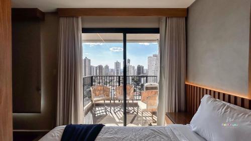 Giường trong phòng chung tại #1704 S# Lindo Flat decorado mobiliado- St. Bueno