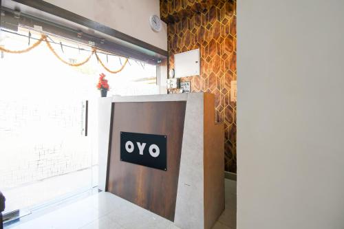 Hotel O Chaya Inに飾ってある許可証、賞状、看板またはその他の書類