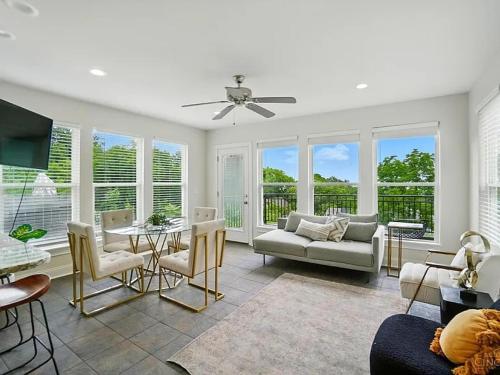 a living room with a couch and a table at Panoramic Views -Downtown Cincinnati in Cincinnati