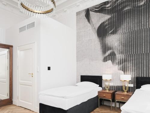 Ένα ή περισσότερα κρεβάτια σε δωμάτιο στο Aparthotel T12