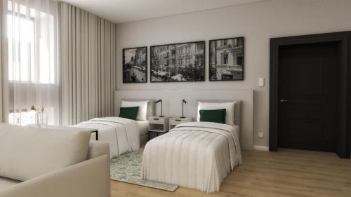 Ένα ή περισσότερα κρεβάτια σε δωμάτιο στο Aparthotel T12