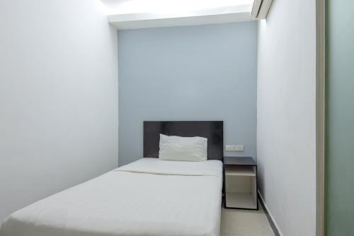 Cama o camas de una habitación en Hotel Pavilion Port