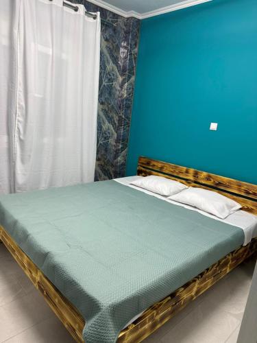 Postel nebo postele na pokoji v ubytování Lilia Apartments