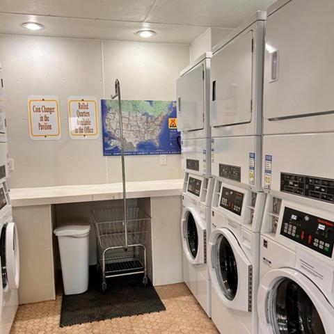 a laundry room with two washer and dryer at KOA Catskill Mountains Dome 2 in Gilboa