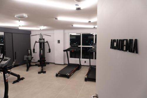 a gym with treadmills and machines in a room at ibis Arcoverde in Arcoverde
