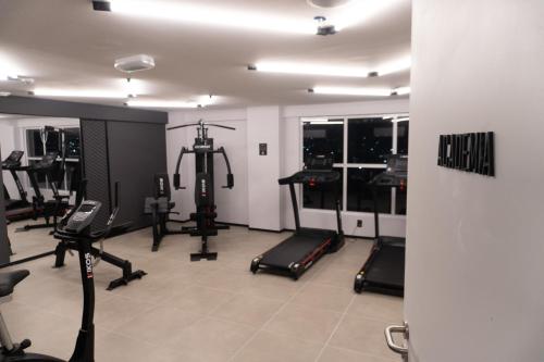 a gym with several exercise equipment in a room at ibis Arcoverde in Arcoverde