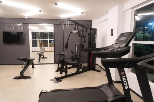 a gym with treadmills and machines in a room at ibis Arcoverde in Arcoverde